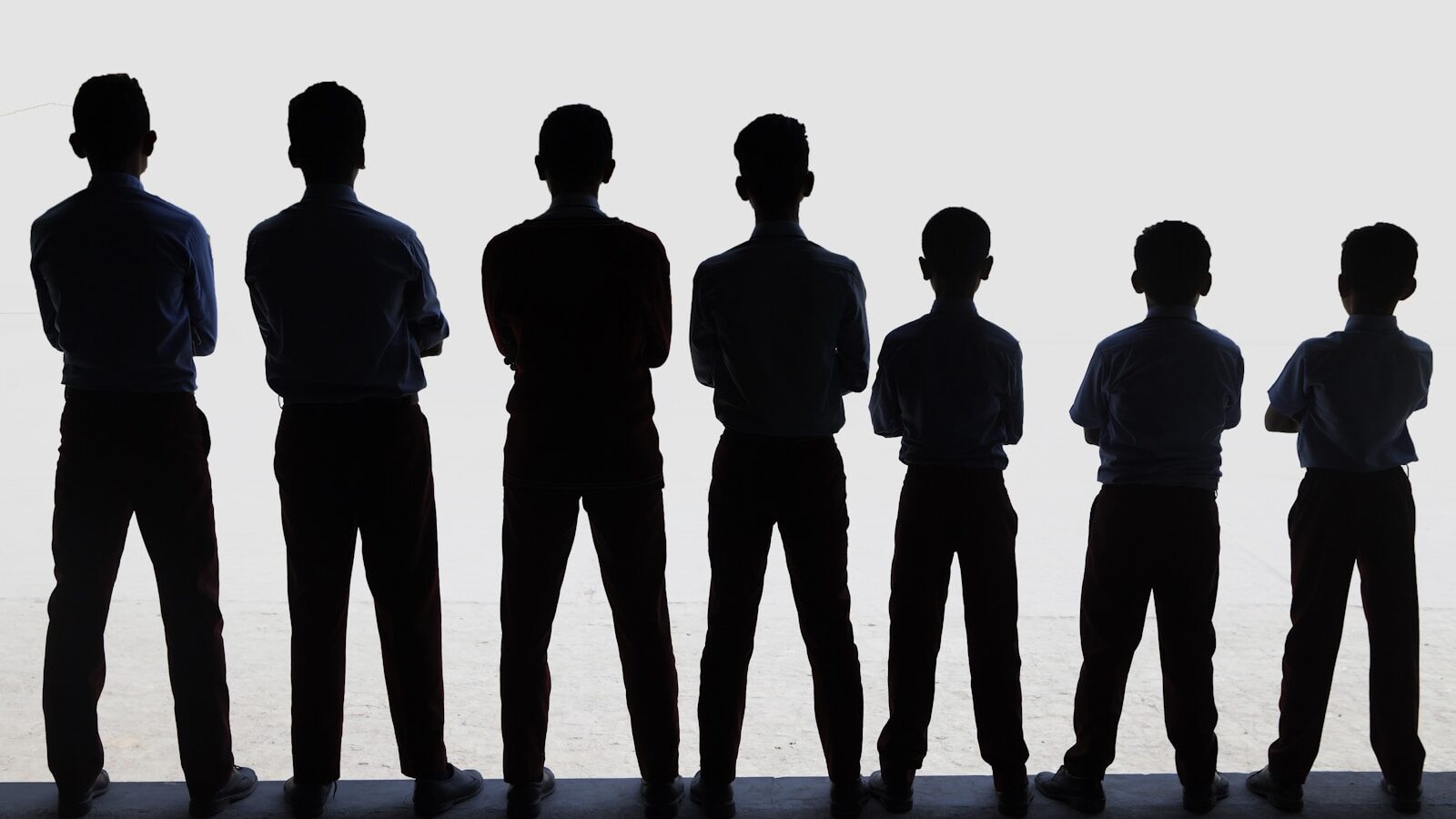 A group of people standing next to each other